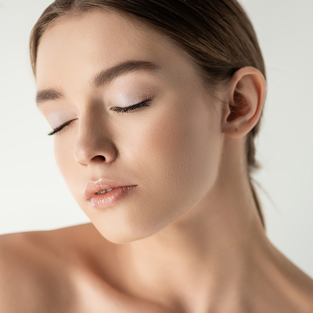 pretty young woman with closed eyes